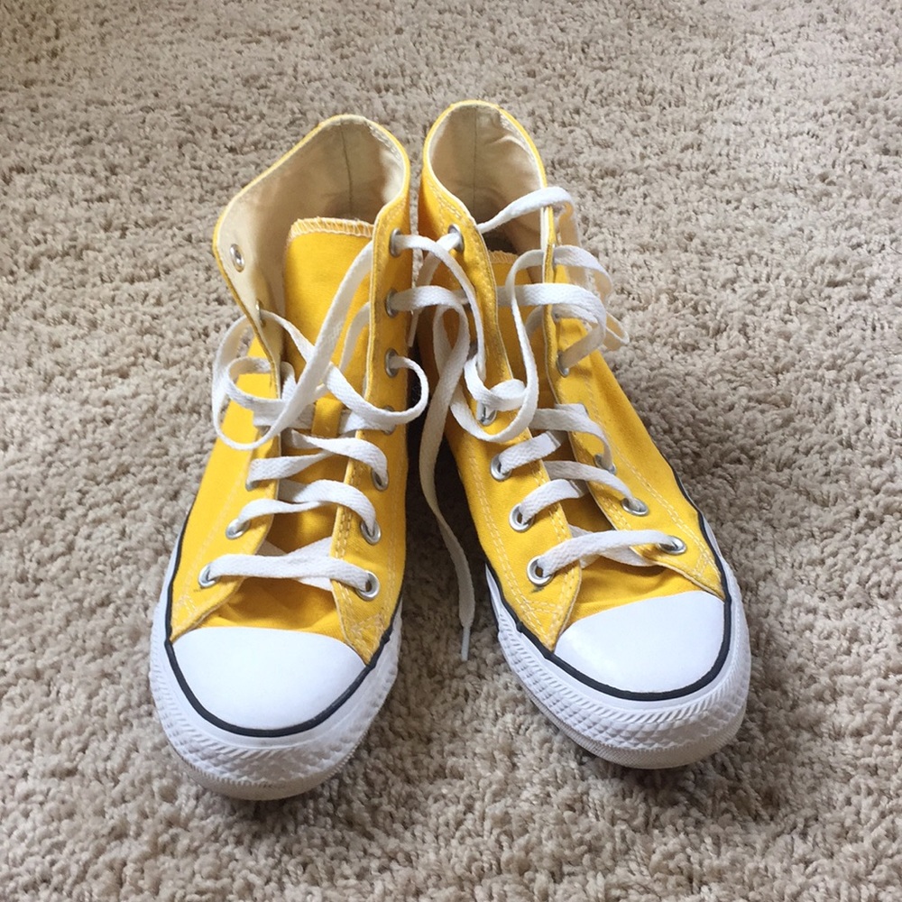 Yellow high top converse